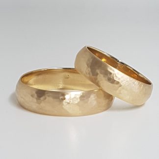 Wedding rings in 9ct hammered, yellow gold