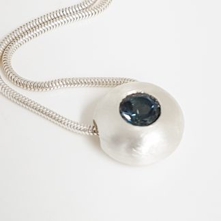 Sea Urchin -pendant in sterling silver with London blue topaz