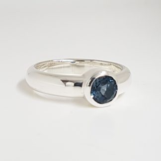 Sterling silver ring with london blue topaz