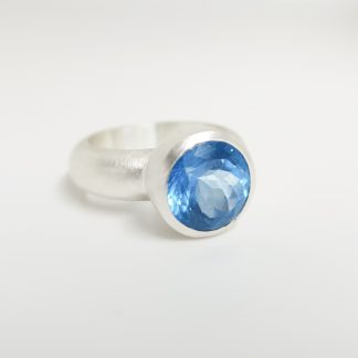Statement silver ring with swiss blue topaz