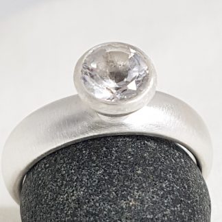 Sterling silver ring with white topaz
