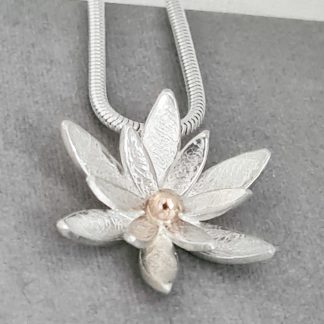 Water lily pendant in sterling silver and gold bead