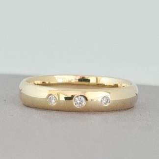 Elegant 18 Karat Court Style Wedding/ Engagement Ring with Three Diamonds
