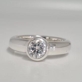 Highly Polished Sterling Silver Ring with 6.5mm White Moissanite Center Stone